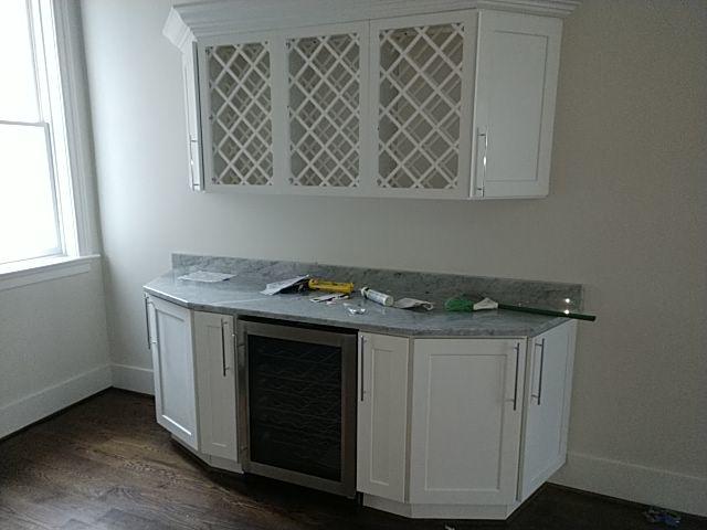 White built-in wine bar